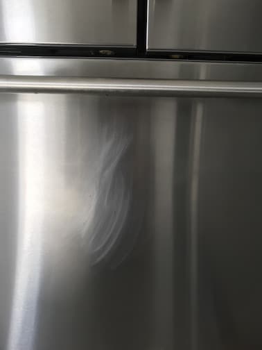 How to remove scratch on stainless steel fridge? : r/fixit