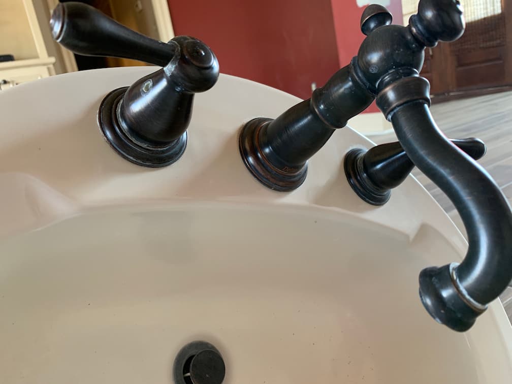 bathroom sink rubbed oiled bronze