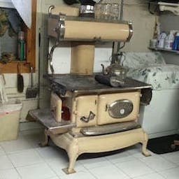 Early 20th century wood cook stove by Range Qualified