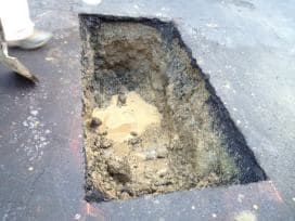 Pit Dug in Driveway