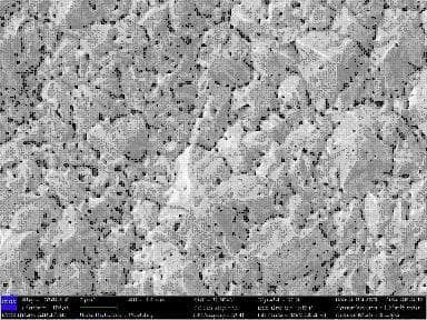 SEM image of pitted gold plating