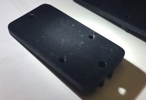 Black anodize issue: pitting and salt-like substance